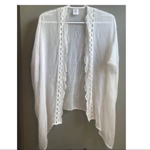 White gauzy swim cover up. Perfect for the beach!